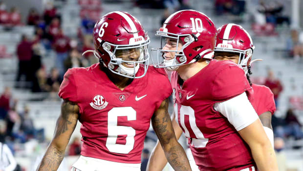 Alabama's DeVonta Smith and Mac Jones celebrate a touchdown