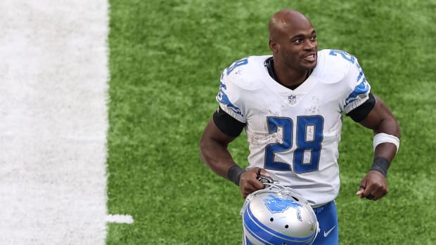 Nov 8, 2020; Minneapolis, Minnesota, USA; Detroit Lions running back Adrian Peterson (28) exits the field following the game against the Minnesota Vikings at U.S. Bank Stadium. Mandatory Credit: Harrison Barden-USA TODAY Sports