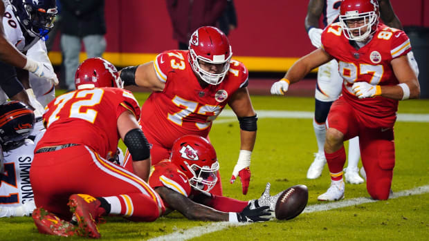 Dec 6, 2020; Kansas City, Missouri, USA; Kansas City Chiefs running back Le'Veon Bell (C) is stopped short of the goal line during the first half against the Denver Broncos at Arrowhead Stadium. Mandatory Credit: Jay Biggerstaff-USA TODAY Sports