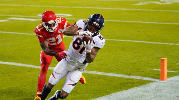 Denver Broncos wide receiver Tim Patrick (81) catches a touchdown pass while defended by Kansas City Chiefs cornerback Bashaud Breeland (21) during the second half at Arrowhead Stadium.