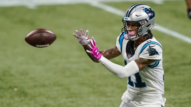 Carolina Panthers wide receiver Robby Anderson (11) catches a pass against the Atlanta Falcons during the first half at Mercedes-Benz Stadium.