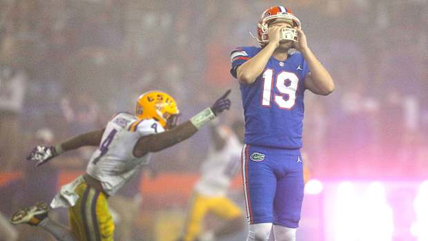 Florida kicker Evan McPherson reacts after missing the game-tying field goal attempt