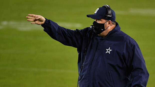 Mike McCarthy coaches for the Cowboys.