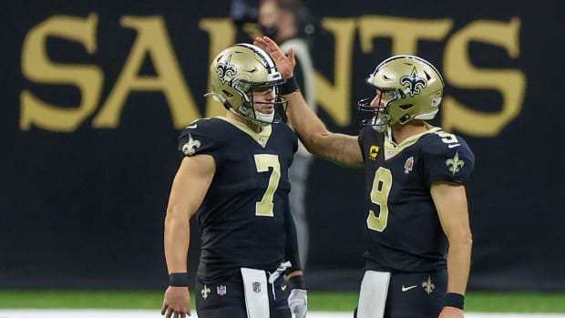 Sep 13, 2020; New Orleans, Louisiana, USA; New Orleans Saints quarterback Drew Brees (9) and quarterback Taysom Hill (7) during the fourth quarter against the Tampa Bay Buccaneers at the Mercedes-Benz Superdome. Mandatory Credit: Derick E. Hingle-USA TODAY Sports