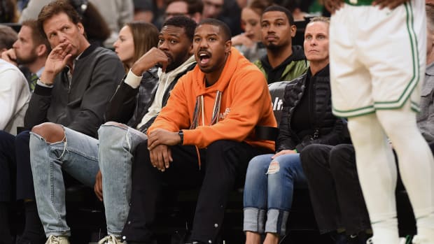 May 3, 2019; Boston, MA, USA; American actor Michael B Jordan shouts to Boston Celtics guard Kyrie Irving (not pictured) during the second half in game three of the second round of the 2019 NBA Playoffs against the Milwaukee Bucks at TD Garden.