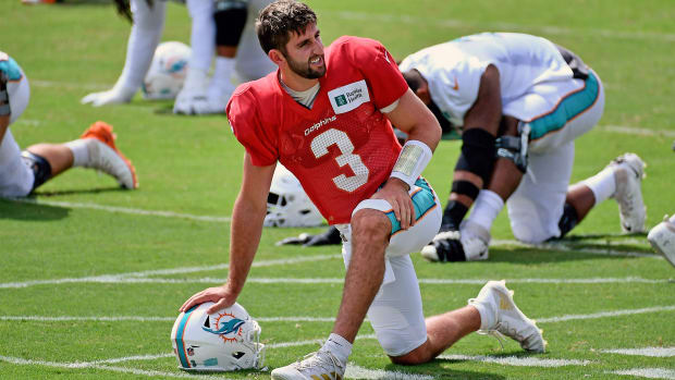 Sep 4, 2020; Miami Gardens, Florida, United States; Miami Dolphins quarterback Josh Rosen (3) stretches during training camp at Baptist Health Training Facility.