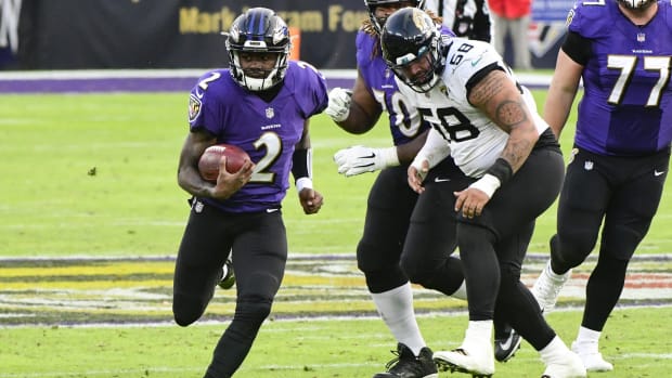 Dec 20, 2020; Baltimore, Maryland, USA; Baltimore Ravens quarterback Tyler Huntley (2) runs during the fourth quarter against the Jacksonville Jaguars at M&T Bank Stadium.