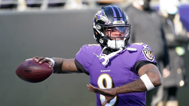 Dec 27, 2020; Baltimore, Maryland, USA; Baltimore Ravens quarterback Lamar Jackson (8) warms up prior to the game against the New York Giants at M&T Bank Stadium.