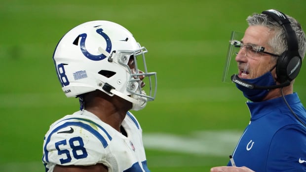 Indianapolis Colts linebacker Bobby Okereke (left) talks to head coach Frank Reich during a Week 15 road win at Las Vegas.
