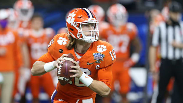 Jan 1, 2021; New Orleans, LA, USA; Clemson Tigers quarterback Trevor Lawrence (16) attempts a pass against the Ohio State Buckeyes during the first half at Mercedes-Benz Superdome. Mandatory Credit: Chuck Cook-USA TODAY Sports