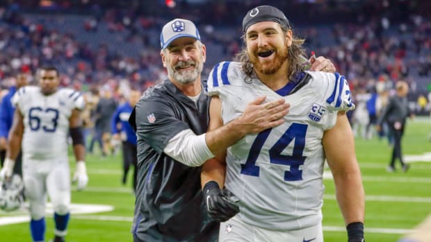 Indianapolis Colts head coach Frank Reich (left) congratulates offensive left tackle Anthony Castonzo after a 2018 win at Houston.