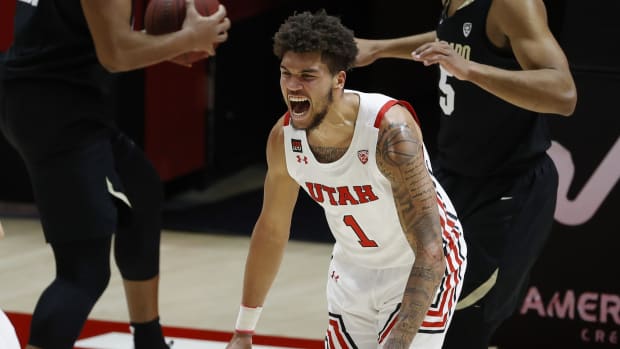 Jan 11, 2021; Salt Lake City, Utah, USA; Utah Utes forward Timmy Allen (1) reacts after a basket in the first half against the Colorado Buffaloes at Jon M. Huntsman Center.