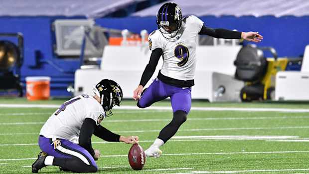 Justin Tucker attempting a kick