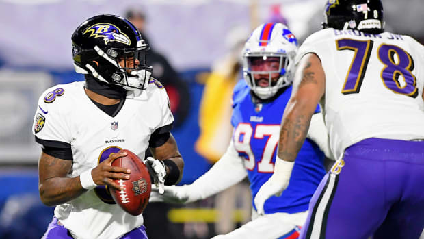 Lamar Jackson looking to pass against the Bills