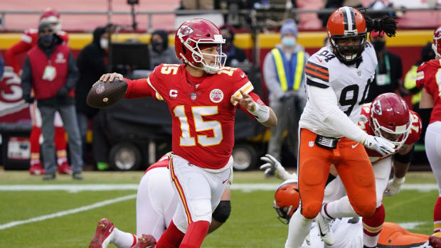 Jan 17, 2021; Kansas City, Missouri, USA; Kansas City Chiefs quarterback Patrick Mahomes (15) throws against the Cleveland Browns during the first half in the AFC Divisional Round playoff game at Arrowhead Stadium. Mandatory Credit: Jay Biggerstaff-USA TODAY Sports