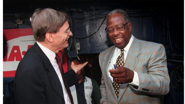 Bud Selig chats with Hank Aaron before the Brewers game against the White Sox at Milwaukee County Stadium, Tuesday, July 20, 1999.