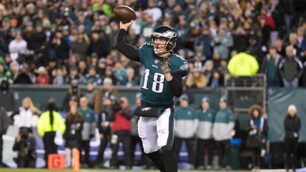Eagles' Josh McCown (18) throws downfield Sunday against the Seahawks.