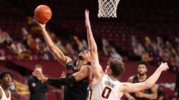 Jan 23, 2021; Minneapolis, Minnesota, USA; Maryland Terrapins guard Aaron Wiggins (2) shoots the ball as Minnesota Gophers center Liam Robbins (0) guards him during the first half at Williams Arena.