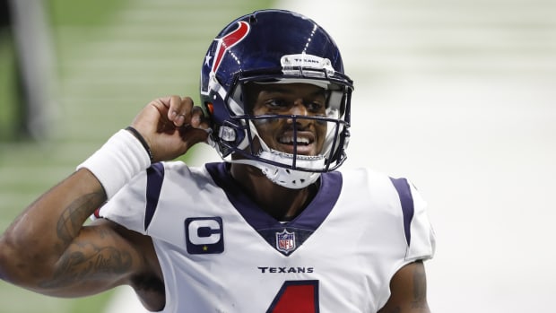 Nov 26, 2020; Detroit, Michigan, USA; Houston Texans quarterback Deshaun Watson (4) smiles after throwing a touchdown pass during the second quarter against the Detroit Lions at Ford Field. Mandatory Credit: Raj Mehta-USA TODAY Sports