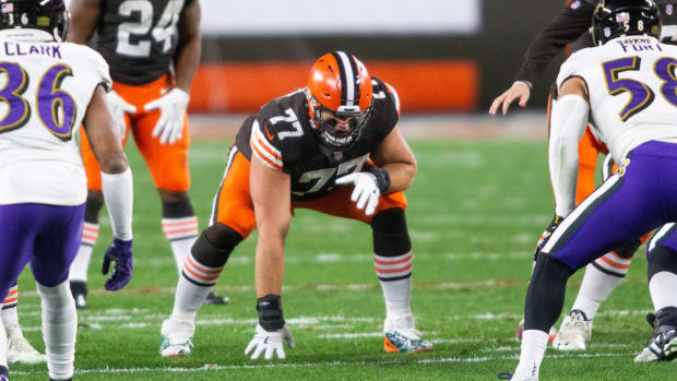 Dec 14, 2020; Cleveland, Ohio, USA; Cleveland Browns offensive guard Wyatt Teller (77) at the line of scrimmage against the Baltimore Ravens during the first quarter at FirstEnergy Stadium. Mandatory Credit: Scott Galvin-USA TODAY Sports