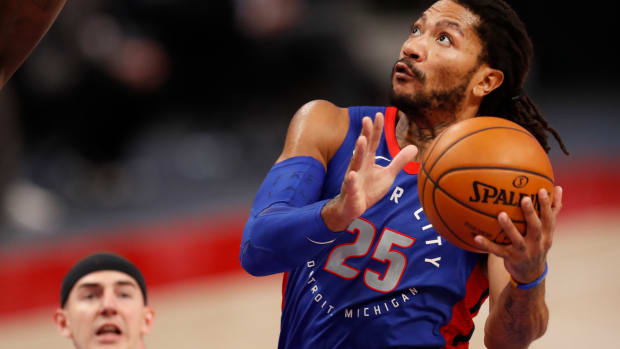 Jan 28, 2021; Detroit, Michigan, USA; Detroit Pistons guard Derrick Rose (25) goes up for a shot during the fourth quarter against the Los Angeles Lakers at Little Caesars Arena. Mandatory Credit: Raj Mehta-USA TODAY Sports