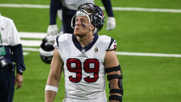 JJ Watt walks off the field after a game with the Texans