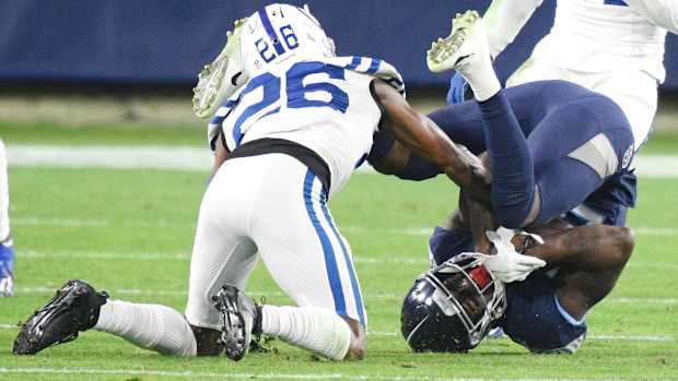 Tennessee Titans wide receiver Corey Davis (84) makes a catch past Indianapolis Colts cornerback Rock Ya-Sin (26) during the second quarter at Nissan Stadium Thursday, Nov. 12, 2020 in Nashville, Tenn. Aab6938