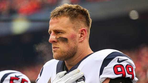 Houston Texans defensive end J.J. Watt (99) observes the national anthem before a AFC Divisional Round playoff football game against the Kansas City Chiefs at Arrowhead Stadium.