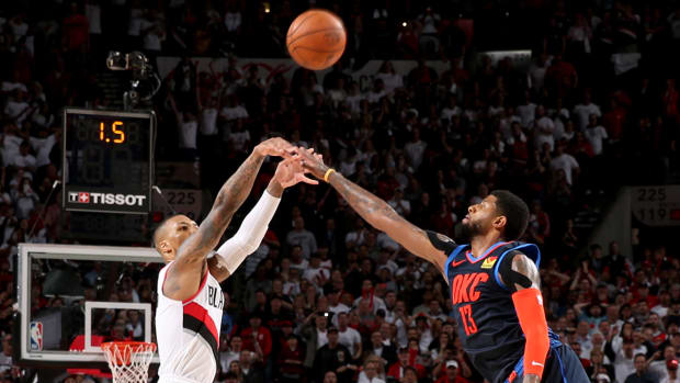 Damian Lillard and Paul George square off