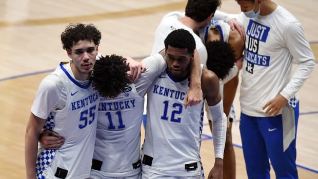 Kentucky players react after a loss to Mississippi State
