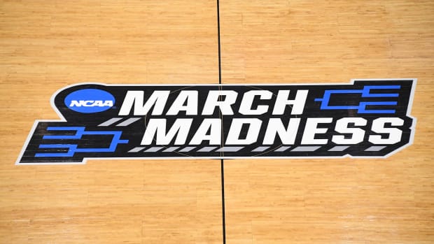 March Madness logo at mid-court during the 2019 NCAA Tournament