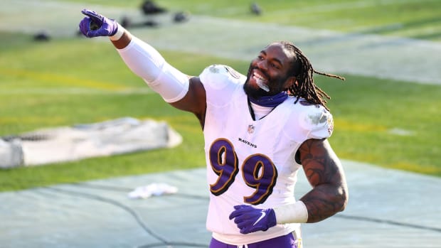 Jan 10, 2021; Nashville, Tennessee, USA; Baltimore Ravens inside linebacker Matt Judon (99) celebrates after the AFC Wild Card playoff game win against the Tennessee Titans at Nissan Stadium. Mandatory Credit: Christopher Hanewinckel-USA TODAY Sports