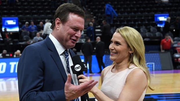 Lisa Byington (right) and Kansas coach Bill Self after a 2019 NCAA tournament game