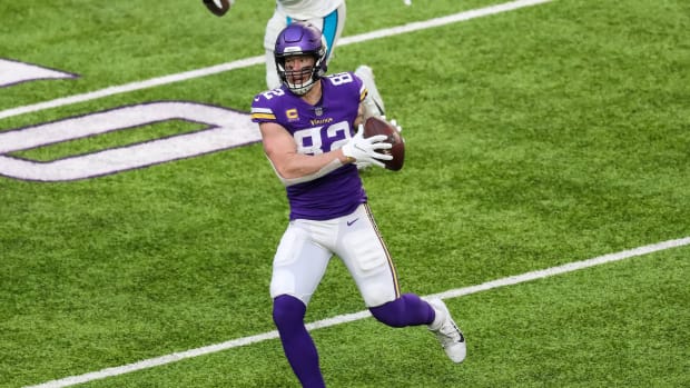 Nov 29, 2020; Minneapolis, Minnesota, USA; Minnesota Vikings tight end Kyle Rudolph (82) catches a pass during the fourth quarter against the Carolina Panthers at U.S. Bank Stadium.