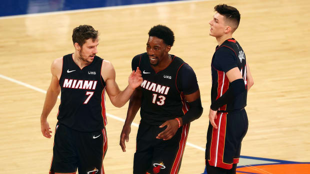 Dragić, Adebayo and Herro had reason to smile during Miami's 98–88 win over the Knicks.