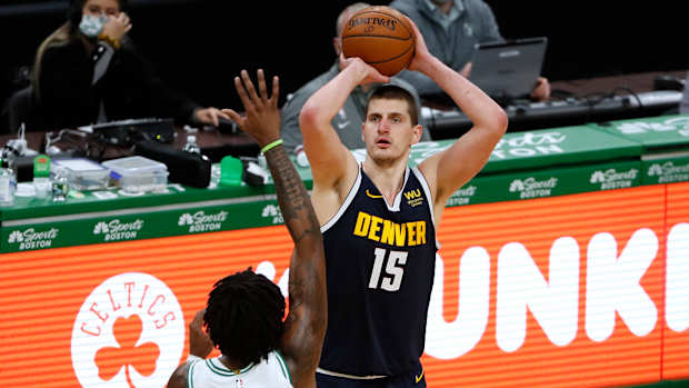 Nikola Jokic shoots during game vs Celtics