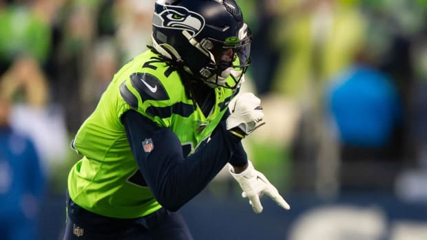 Minnesota Vikings wide receiver Stefon Diggs (14) runs a route while being defended by Seattle Seahawks cornerback Tre Flowers (21) during the game at CenturyLink Field. Seattle defeated Minnesota 37-30.