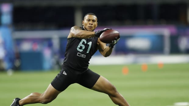 Mar 1, 2020; Indianapolis, Indiana, USA; Minnesota Golden Gophers defensive back Antoine Winfield Jr (DB61) goes through pass catching workout drills during the 2020 NFL Combine at Lucas Oil Stadium.
