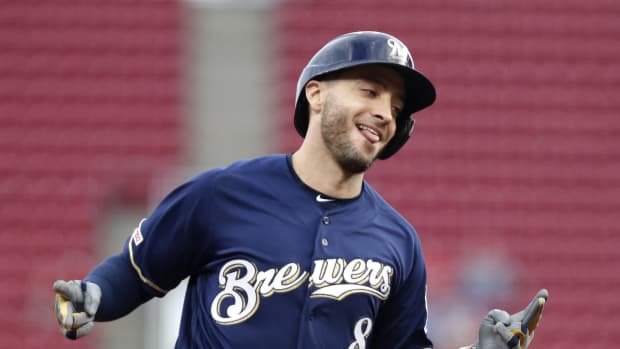 Sep 25, 2019; Cincinnati, OH, USA; Milwaukee Brewers left fielder Ryan Braun (8) reacts as he rounds the bases after hitting a grand slam against the Cincinnati Reds during the first inning at Great American Ball Park. Mandatory Credit: David Kohl-USA TODAY Sports