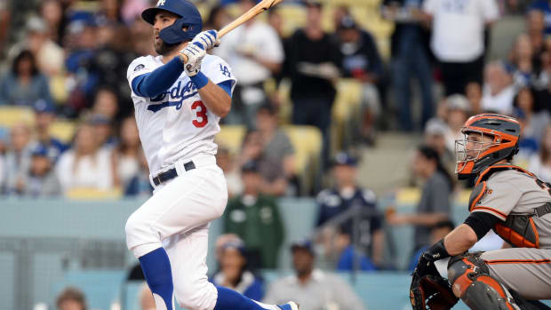 June 19, 2019; Los Angeles, CA, USA; Los Angeles Dodgers shortstop Chris Taylor (3) hits a three run home run against the San Francisco Giants during the first inning at Dodger Stadium. Mandatory Credit: Gary A. Vasquez-USA TODAY Sports