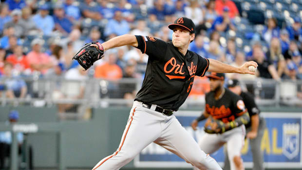 Baltimore Orioles starting pitcher John Means (67) delivers a pitch in the first inning against the Kansas City Royals at Kauffman Stadium.
