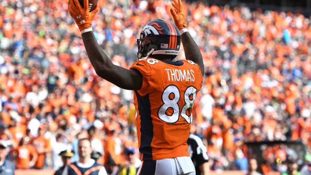 Denver Broncos wide receiver Demaryius Thomas (88) looks for a touchdown call by the officials in the fourth quarter against the Seattle Seahawks at Broncos Stadium at Mile High.