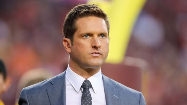 ESPN's Todd McShay on the sidelines of a game.