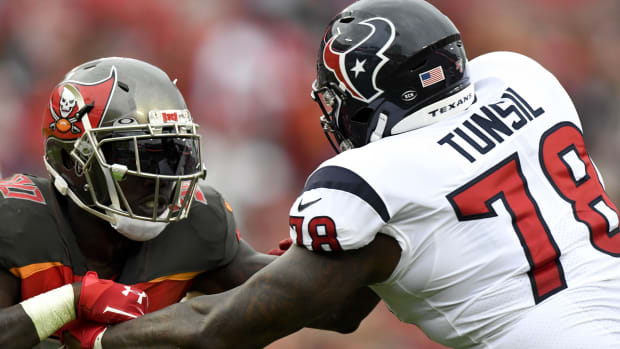 Tampa Bay Buccaneers linebacker Jason Pierre-Paul (90) rushes the passer as Houston Texans offensive tackle Laremy Tunsil (78) defends during the fourth quarter at Raymond James Stadium. Mandatory Credit: Douglas DeFelice-USA TODAY Sports
