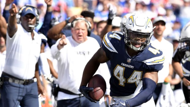 Sep 16, 2018; Orchard Park, NY, USA; Los Angeles Chargers linebacker Kyzir White (44) runs with the ball after making an interception against the Buffalo Bills during the fourth quarter at New Era Field