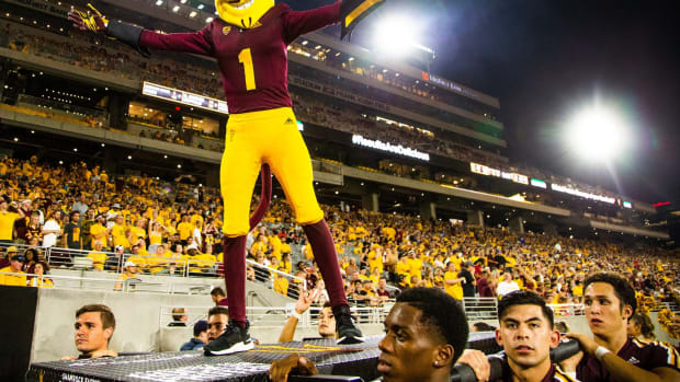 Sparky, the Arizona State University mascot, encourages the student section during second quarter action against Kent State University at Sun Devil Stadium, Thursday, August 29,