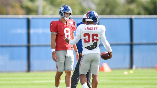 New York Giants quarterback Daniel Jones (8) works with running back Saquon Barkley (26) during practice on Wednesday, Sept. 18, 2019, in East Rutherford. The Giants named Jones the starting quarterback over veteran Eli Manning (not pictured) in Week 3 against the Tampa Bay Buccaneers.