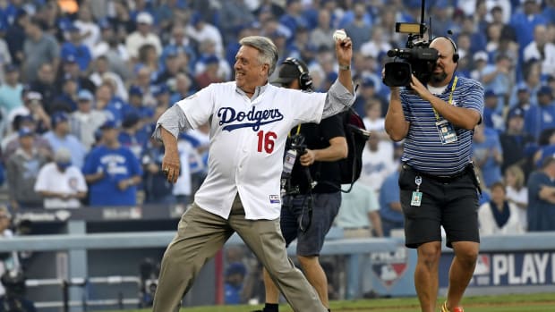 Oct 18, 2016; Los Angeles, CA, USA; MLB former player Rick Monday throws the ceremonial first pitch before the game between the Los Angeles Dodgers and the Chicago Cubs in game three of the 2016 NLCS playoff baseball series at Dodger Stadium. Mandatory Credit: Richard Mackson-USA TODAY Sports