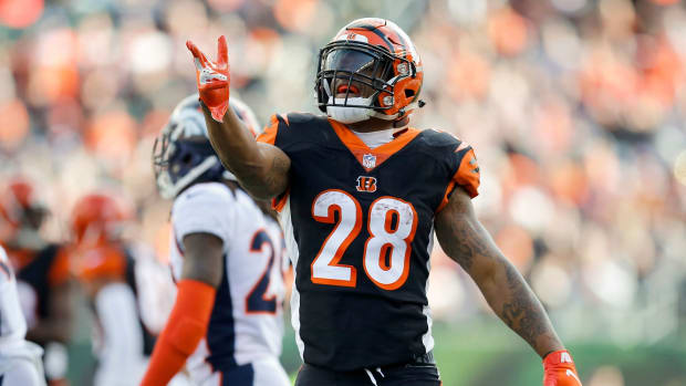 Cincinnati Bengals running back Joe Mixon (28) celebrates after running for a first down in the first quarter of the NFL Week 13 game between the Cincinnati Bengals and the Denver Broncos at Paul Brown Stadium in downtown Cincinnati on Sunday, Dec. 2, 2018. The Broncos led 7-3 at halftime. Denver Broncos At Cincinnati Bengals