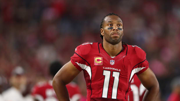 Arizona Cardinals wide receiver Larry Fitzgerald (11) reacts against the New York Jets at University of Phoenix Stadium.